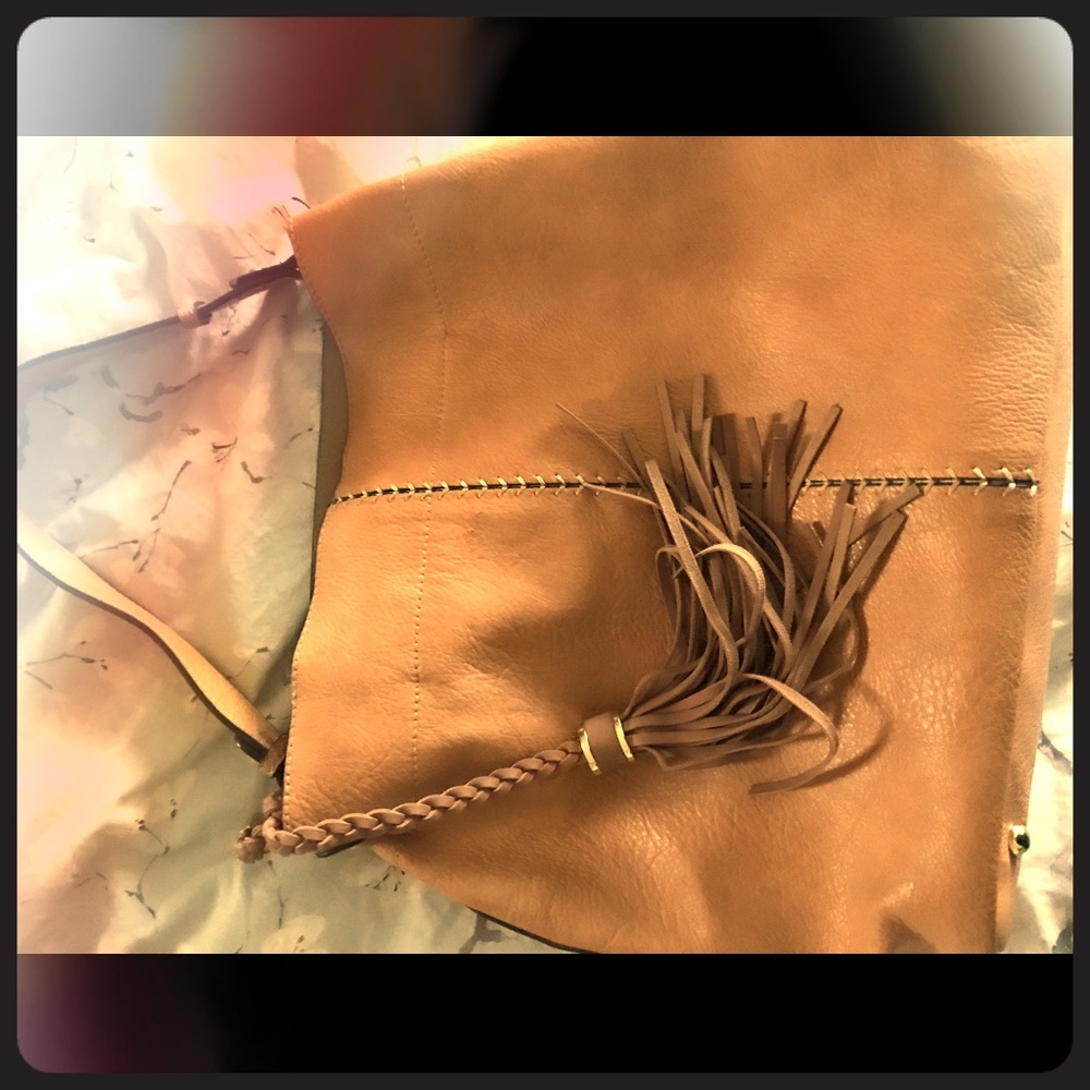Brown Vegan leather footed tote
